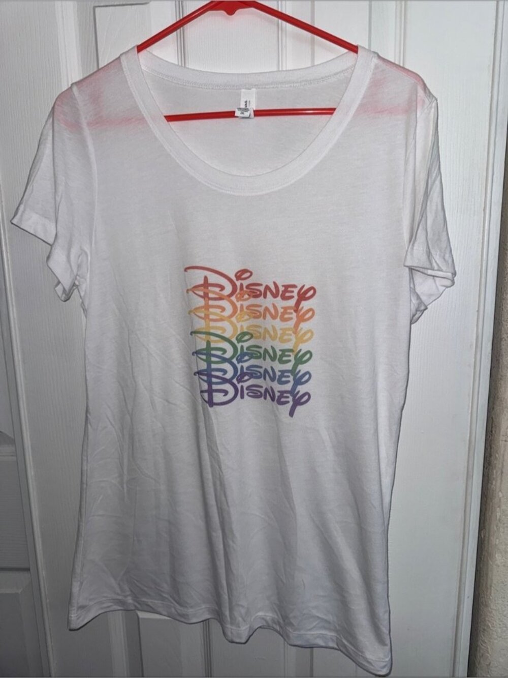 Disney White Tee with Vertical Rainbow Script Logo